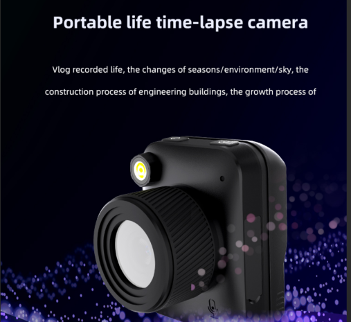 Black compact time-lapse camera with large lens and small LED light on dark background.