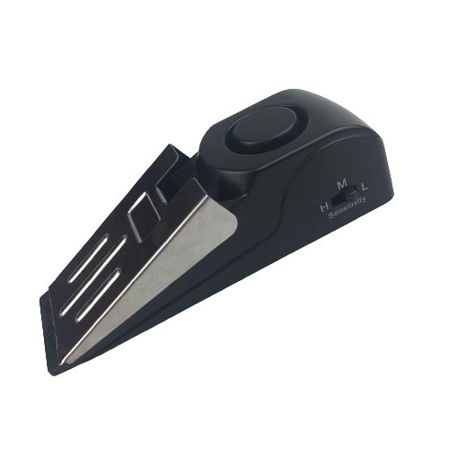 An angled view of a doorstop featuring a metal plate that detects opening doors. - The Spy Store.