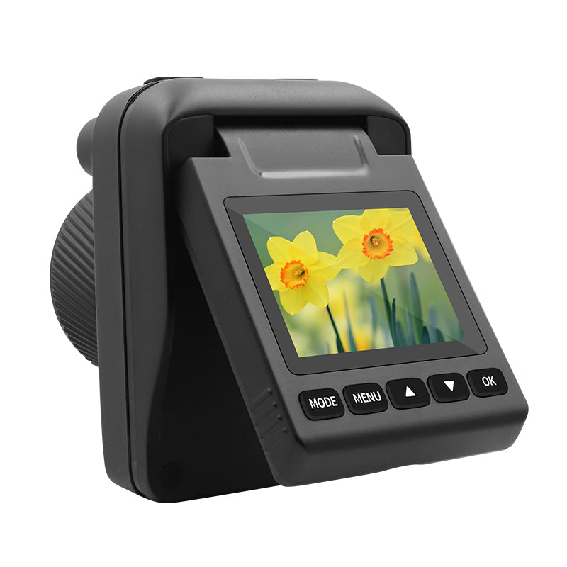 Black digital camera with flip-out screen displaying yellow flowers, shown from a rear side angle.