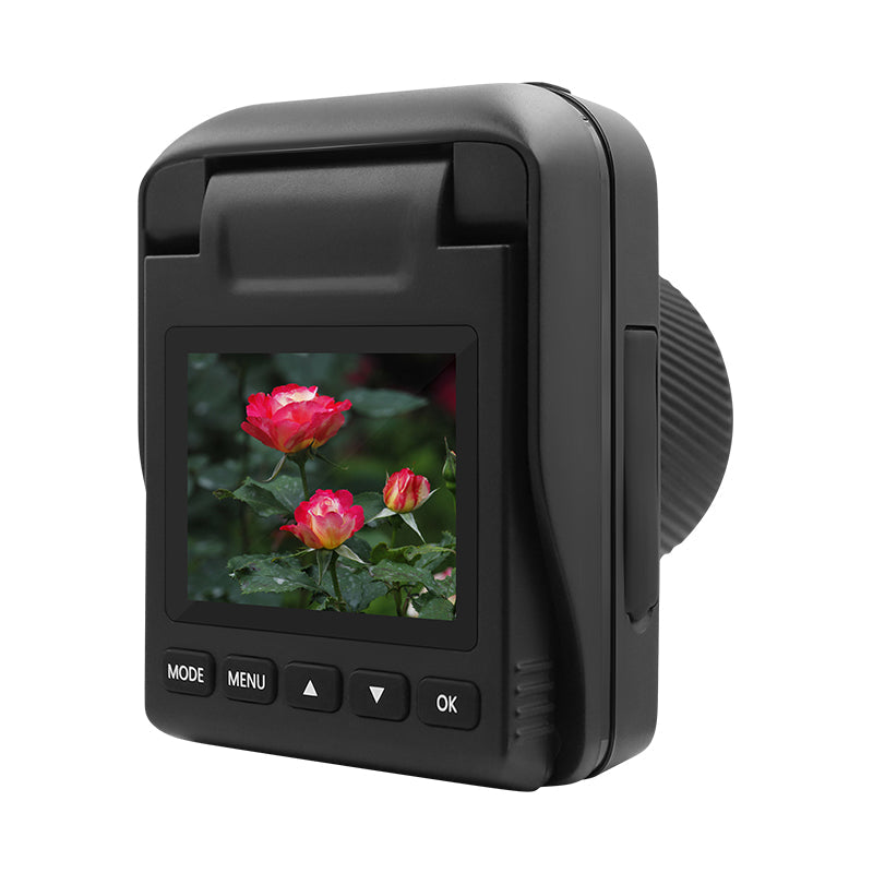 Black digital camera facing backward, displaying a photo of pink roses on its LCD screen, with control buttons.